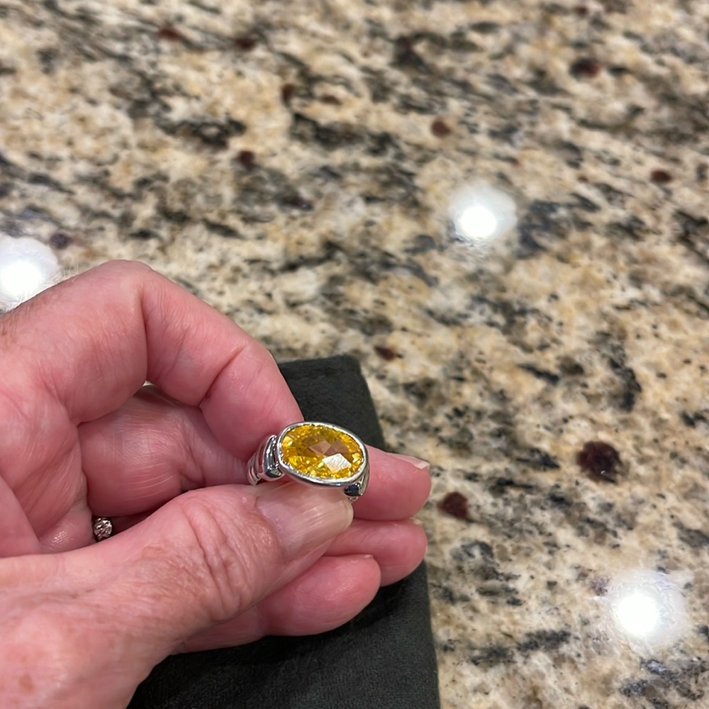 Costume ring - faceted oval yellow topaz, braided silver band, size 6